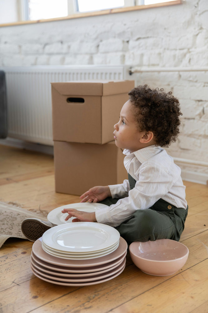 relocating child with moving boxes