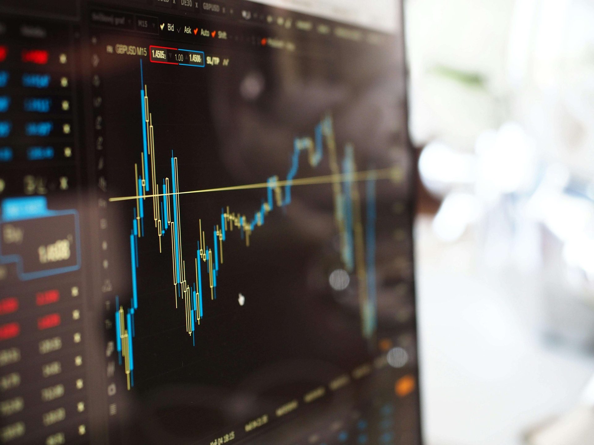 Stock market price chart on a screen